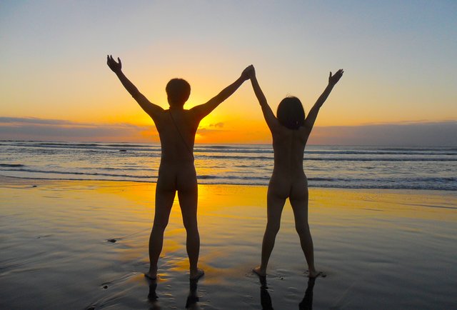 Couple Nude On Beach At Sunset