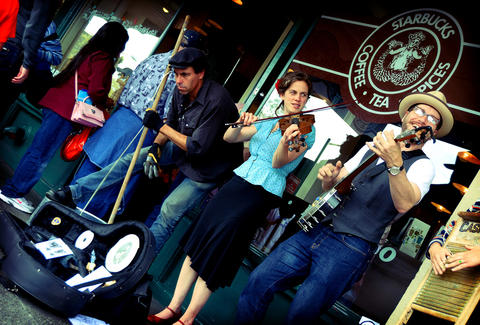 band in front of starbucks