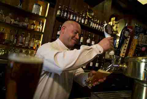 bartender pouring beer