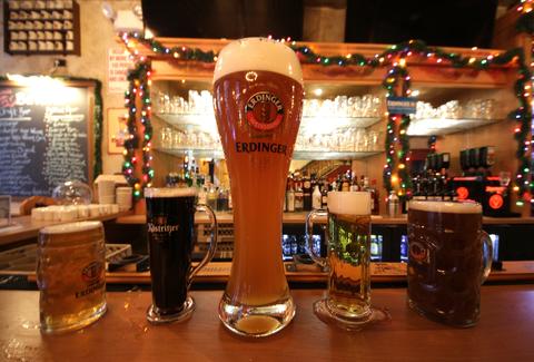 3-liter steins in a German beer mansion Downtown - Thrillist NY
