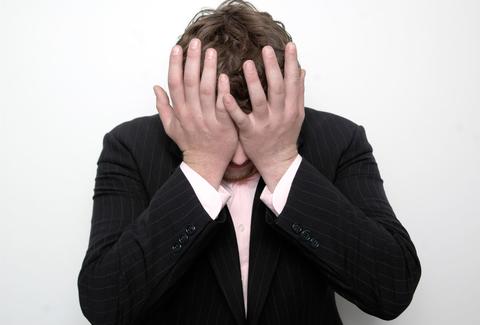 depressed, head in hands