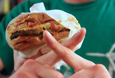 burger with a hex sign in front