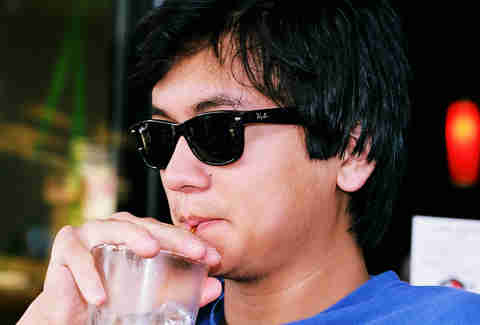 Sipping cocktail in shades