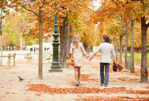Holding hands in the park