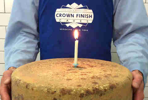 Cheese with a candle