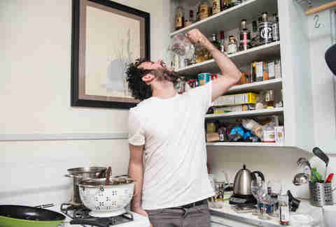 drinking from measuring cup