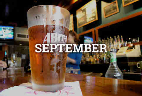 abita beer on bar in pint glass in new orleans