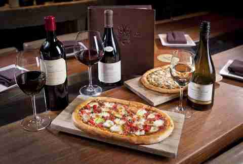 Interior of La Cave wine bar with pizza at the Wynn Las Vegas in Nevada