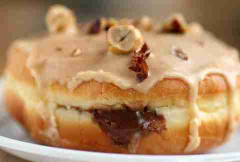 donut with nuts, maple and chocolate, frosting