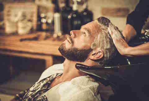 man washing hair, man hair cut, man shapooing