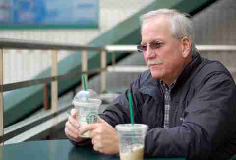 elderly man at Starbucks