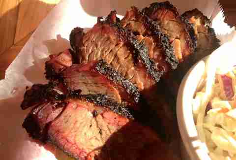 Sliced brisket lying on wax paper