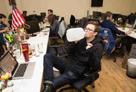 Wil Fulton Drinking Water Next to Champagne Gun