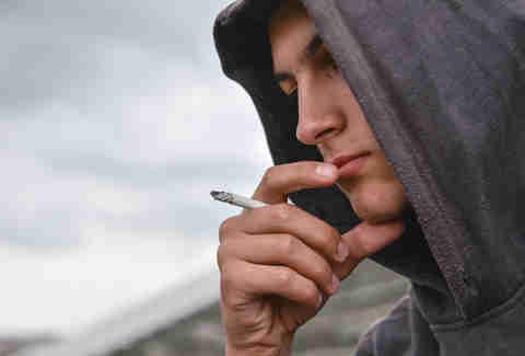 man smoking weed