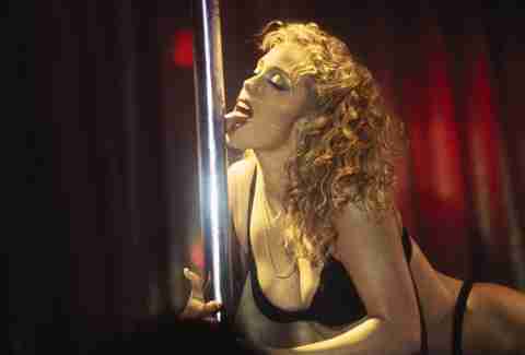 Elizabeth Berkley from Showgirls licking a pole