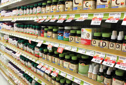 shelves of multivitamin bottles