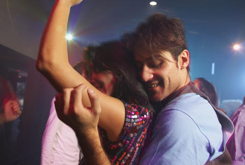 Couple dancing in nightclub
