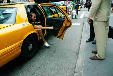 man getting out of taxi cab