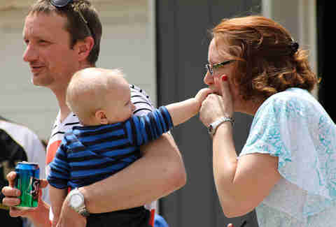 woman kissing baby