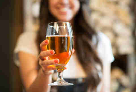 woman with glass of beer