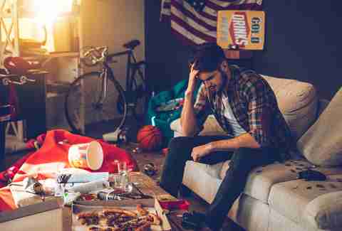 Man frustrated in living room