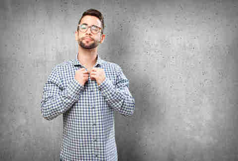 Guy getting dressed