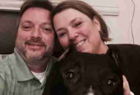 nurse takes care of man's dog