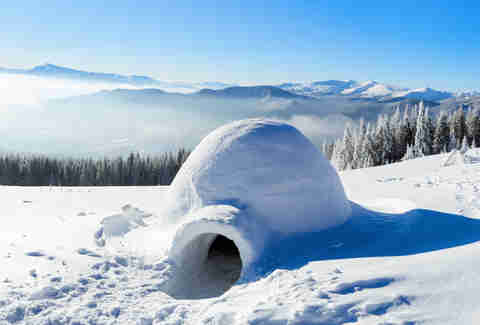 Snow Camping in an igloo