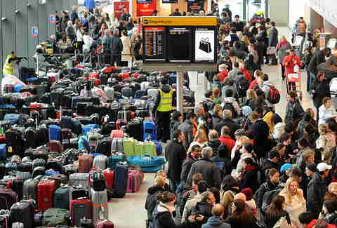 Airline Crowd with Bags