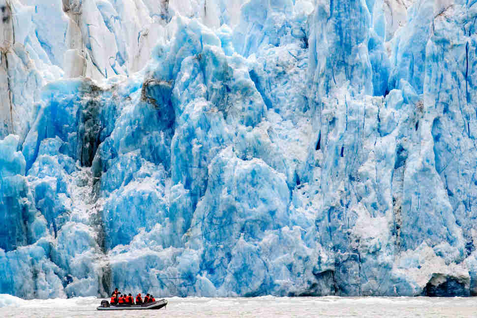Boat in front of Dawes Glacier, Tracy Arm in Fords Terror Wilderness, Alaska