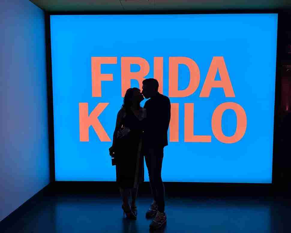 Brooklyn Museum people in front of Frida Kahlo screen