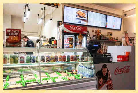The two-table restaurant serves hot wings and spicy chicken burgers.