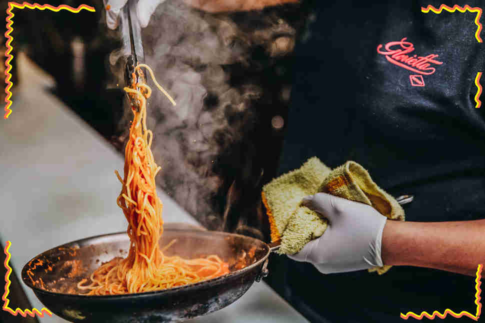 Gonzalez making a pasta dish