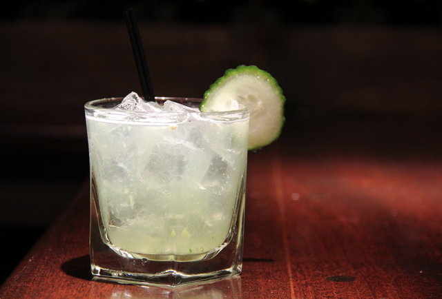 Cocktail with a cucumber garnish-Kristophe