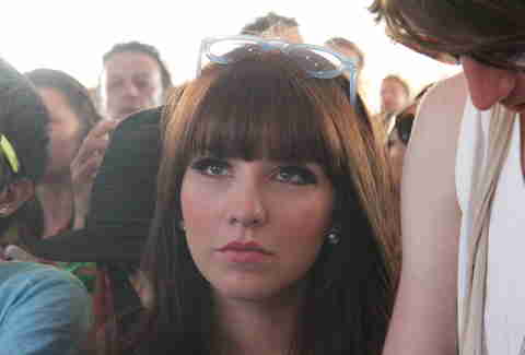 A girl poses at Coachella 2013