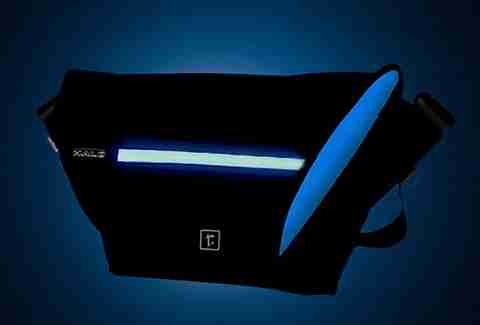 A glowing Rickshaw Halo Zero messenger bag