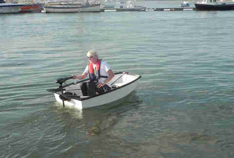 Man rowing the Boatpack on the water