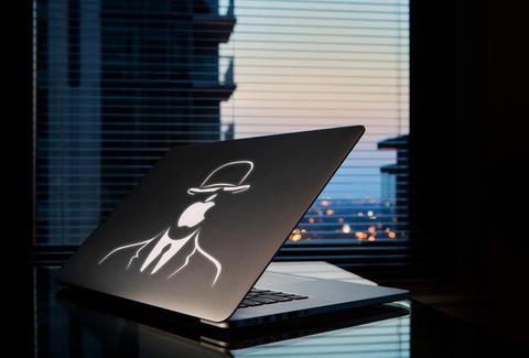 Macbook with Magritte's Son of Man