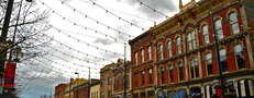 Take a deeper dive into a 'hood filled with absinthe, GQ haircuts, and time-traveling cowboys