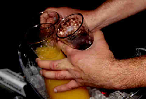 Hands grasping mixers at Haven nightclub at the Golden Nugget in Atlantic City