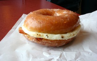 First Taste: Dunkin Donuts' totally healthy new bacon 'n egg Glazed Donut Breakfast Sandwich