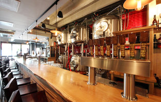 Fill your stomach and growlers at this impressive brewpub