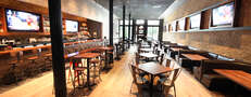 Double-decker pizza and wall-to-wall whiskey