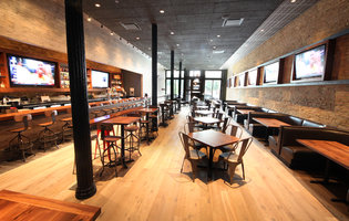 Double-decker pizza and wall-to-wall whiskey