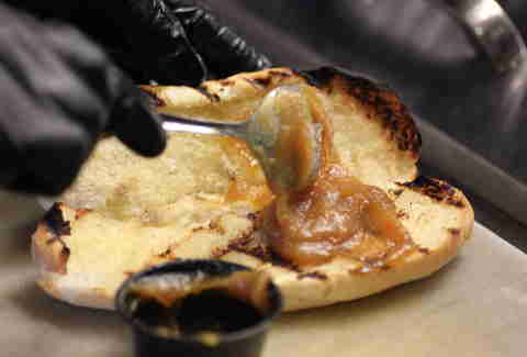 Jameson whiskey apple butter spread onto bun