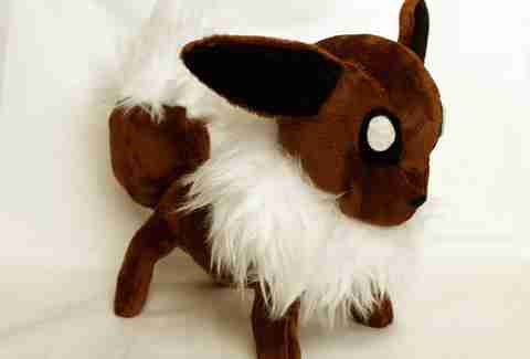 Plush Goat with demon eyes