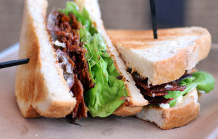 Smoked chicken skin BLTs, moonshine margaritas, and other reasons to be happy Lillie's is back