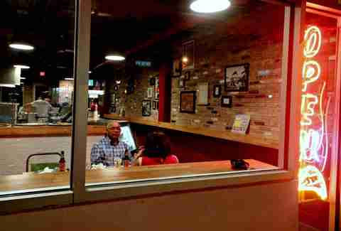 Looking in at Mansini's Pizza House
