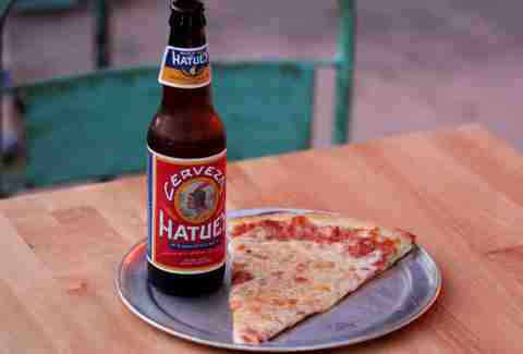 Slice and beer at Mansini’s Pizza House