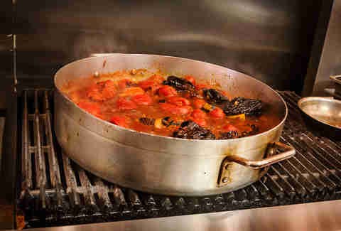 Reducing the sauce at Salt and Cleaver in San Diego.